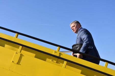 Prime Minister Robert Fico boards a plane at M. R. Štefánik Airport in Bratislava before departing for an emergency meeting of European Union member state leaders in Brussels on Thursday, March 6, 2025.