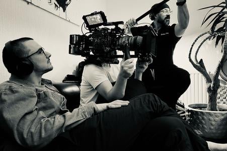 Al Pillar (left) projects a Hitchcockian intensity as he directs a scene.