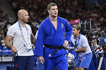 Slovenský džudista Márius Fízeľ s trénerom Jánom Gregorom na archívnej snímke.