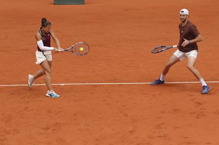 Sara Errani a Andrea Vavassori.