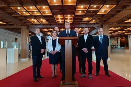 Chair of the Slovak National Party (SNS) Andrej Danko (centre), Štefan Harabin (left), SNS MPs Peter Kotlár (second from right), Roman Michelko (right), Dagmar Kramplová (second from left), and Slovak Revival Movement (SHO) leader Róbert Švec during a press conference on anti-Russia sanctions in Bratislava on Thursday, June 5, 2025.
