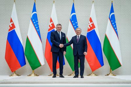 Prime Minister Robert Fico shakes hands with Uzbek President Shavkat Mirziyoyev during a visit to Uzbekistan in early June 2025.