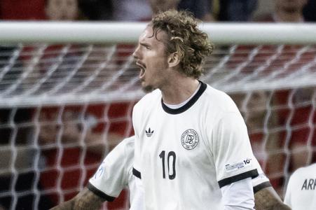 Hráč Nick Woltemade (Nemecko) sa teší po víťazstve v zápase základnej B-skupiny ČR - Nemecko na majstrovstvách Európy hráčov do 21 rokov v Dunajskej Strede v nedeľu 15. júna 2025. Nemecko zvíťazilo nad Českom 4:2.