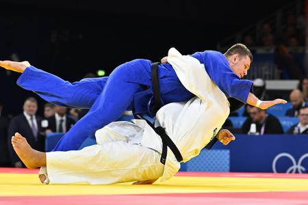 Na snímke hore slovenský džudista Márius Fízeľ počas XXXIII. letných olympijských hier v Paríži.