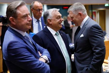 From left, Belgium's Prime Minister Bart De Wever, Germany's Chancellor Friedrich Merz, Hungary's Prime Minister Viktor Orbán and Slovakia's Prime Minister Robert Fico attend a round table meeting at an EU summit in Brussels, Thursday, 26 June 2025.