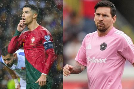 Lionel Messi (vpravo) sa v počte vstrelených gólov z hry už pretlačil pred Cristiana Ronalda (vľavo, v súboji s Dávidom Hanckom).
