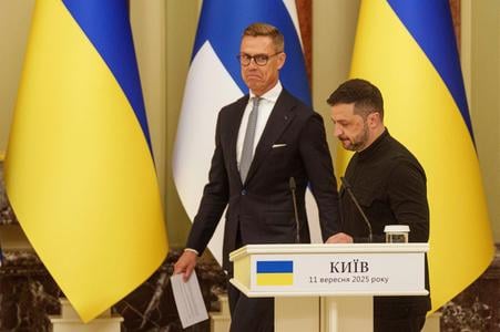 Ukraine's President Volodymyr Zelensky and Finland's President Alexander Stubb arrive for a joint press conference in Kyiv, Ukraine, on 11 September 2025.