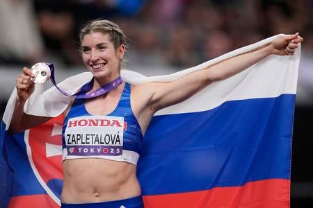 Bronze medallist Emma Zapletalová of Slovakia celebrates after the women’s 400 metres hurdles final at the World Athletics Championships in Tokyo, Friday, 19 September 2025.