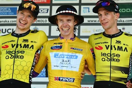 Britain’s Paul Double (centre) of Team Jayco AlUla, winner of both the final stage and the overall classification, celebrates on the podium after the 5th and last stage of the 69th Tour of Slovakia on Kohútka, Púchov district, Sunday 21 September 2025. Fellow Briton Thomas Gloag (left) of Visma Lease a Bike finished third overall, with Dutchman Bart Lemmen (right), also of Visma Lease a Bike, in second.
