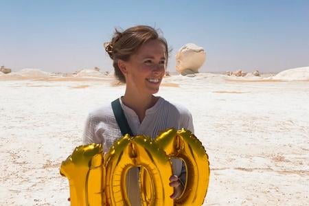 Kelsey Yurek visiting White Desert National Park in her 100th country, Egypt, on 19 June 2023.