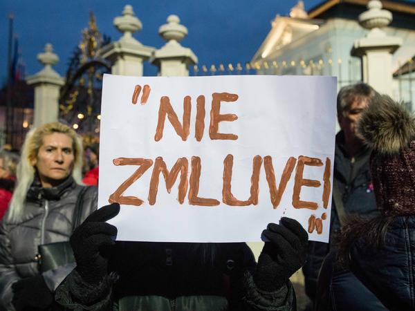 "No to the agreement," read one of the banners.