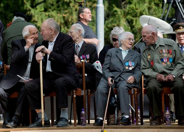 Second World War veterans attend the national celebrations marking the 70th anniversary of the end of the war and Victory over Fascism Day at the memorial in the Háj-Nicovô military cemetery in Liptovský Mikuláš on May 8, 2015.