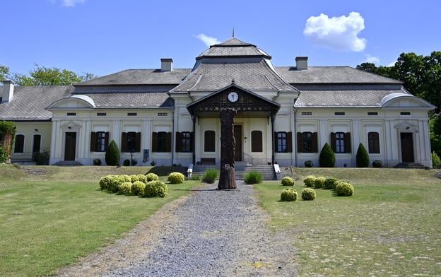 The historic Sennyey manor house in the village of Biel, Trebišov district. Originally completed in 1781 in Baroque style and later remodelled with Rococo-Classical elements, the U-shaped building served various public functions in the 20th century before falling into disrepair. A partial renovation, co-funded by a Slovak-Hungarian cross-border programme between 2007 and 2013, has turned the central section into a museum and library.