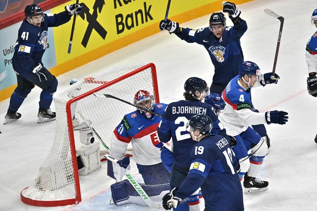 Finnish players Hannes Björninen (24), Jan-Mikael Järvinen (41) and Harri Pesonen (82) celebrate a goal scored by teammate Waltteri Merelä (19) past Slovak goaltender Samuel Hlavaj during the Group A match between Finland and Slovakia at the 88th Ice Hockey World Championship in Stockholm on 20 May 2025.