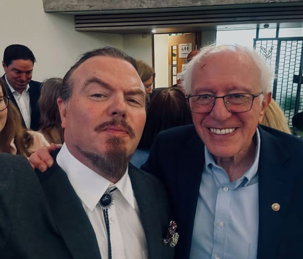 Lukeman poses with US Senator Bernie Sanders