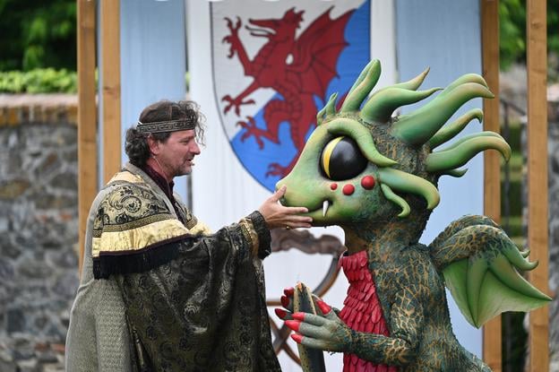 King Marko (played by actor Marko Igonda) and dragon Arnošt during a fairy-tale performance at the Červený Kameň castle.