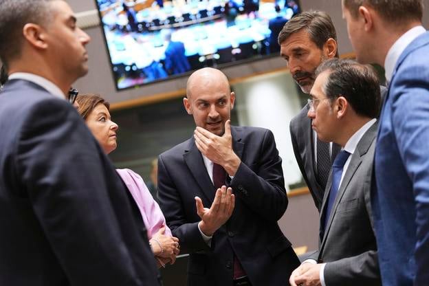 French Foreign Minister Jean-Noel Barrot, centre, speaks with from left, Malta's Foreign Minister Ian Borg, Slovenia's Foreign Minister Tanja Fajon, Slovakia's Foreign Minister Juraj Blanár and Spain's Foreign Minister Jose Manuel Albares Bueno during a meeting of EU foreign ministers at the European Council building in Brussels, Monday, 23 June 2025.