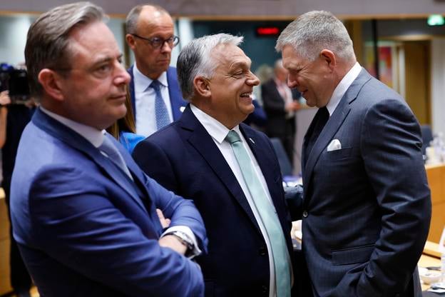 From left, Belgium's Prime Minister Bart De Wever, Germany's Chancellor Friedrich Merz, Hungary's Prime Minister Viktor Orbán and Slovakia's Prime Minister Robert Fico attend a round table meeting at an EU summit in Brussels, Thursday, 26 June 2025.