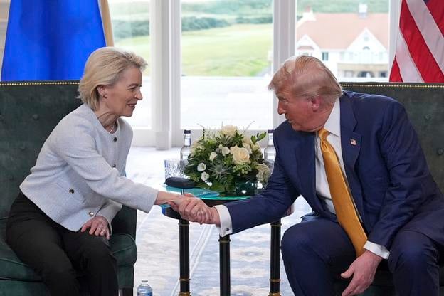 President Donald Trump shakes hands with European Commission President Ursula von der Leyen as they meet at the Trump Turnberry golf course in Turnberry, Scotland, on 27 July 2025.
