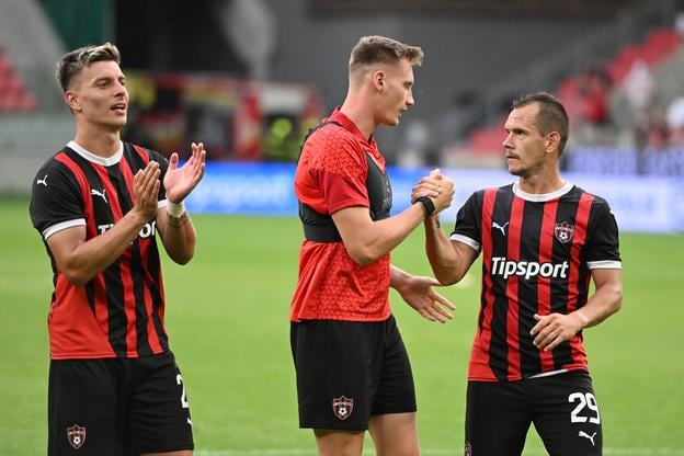 Na snímke radosť hráčov Trnavy po postupe do 3. predkola, zľava Michal Tomič, Patrick Karhan a Martin Mikovič.