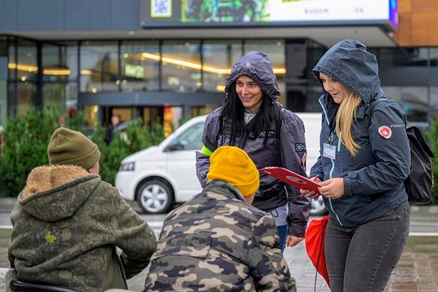 In the photo, volunteers talk with homeless people during the European Homeless Count in Prešov, eastern Slovakia, on 10 October 2025.
