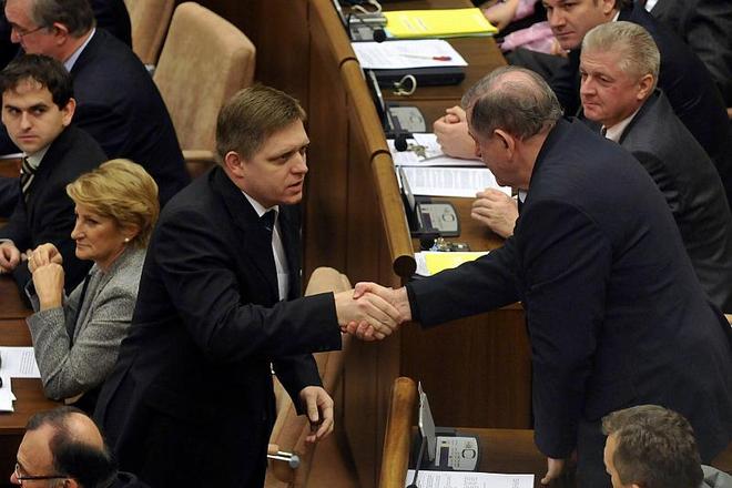 Robert Fico (left) and HZDS boss Vladimír Mečiar congratulate each other over the budget.