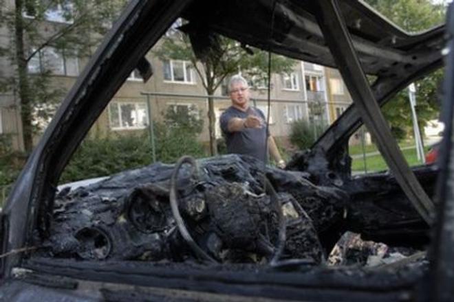 Vincent Lukáč and the burnt car