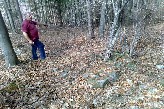 Pupala points to what he believes is a long-lost fortification.
