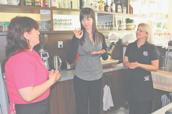 The café’s owner (centre) and her staff.