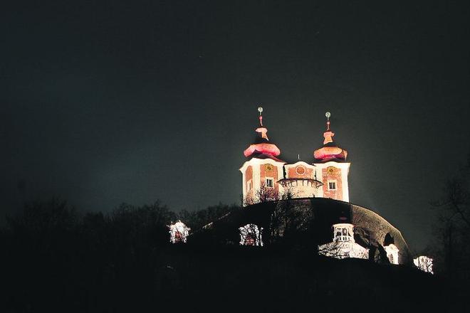 The calvary in Banská Štiavnica is being renovated and isnowlit up at night.