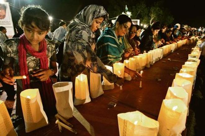 Pakistanis remember the victims of the attack.