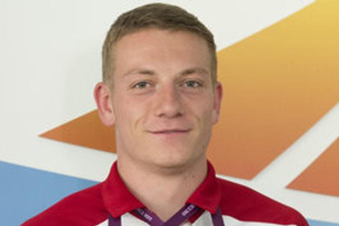Ján Volko poses with his medals after winning gold at European U23 Championship. 