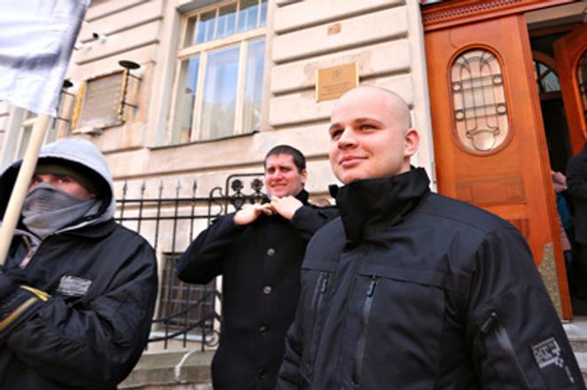 ĽSNS MP MIlan Mazurek (R) goes to his court trial at Specialised Criminal Court in Banská Bystrica, February 26.