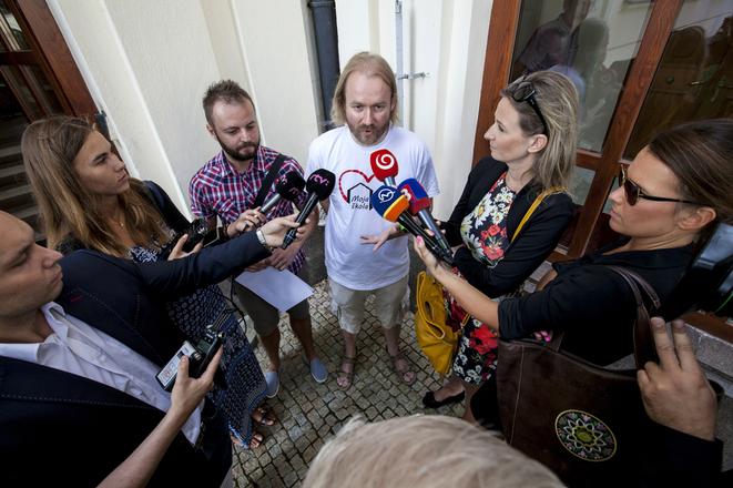 Members of the Slovak Teachers Initiative (ISU) Vladimír Crmoman (in the middle) and Luboš Sibert who have carried out graded strikes for better teachers's conditions. 
