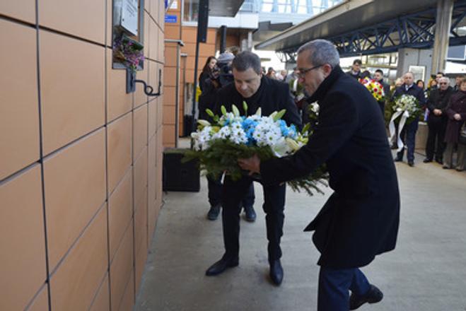 Israeli Ambassador to Slovakia Zvi Aviner Vapni (R) lays wreath to the memorial plaque at the Poprad railway station, commemorating the first transport to Auschwitz.