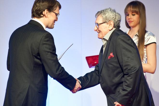 Ex-culture minister Marek Maďarič awards Milan Dobeš in 2012.