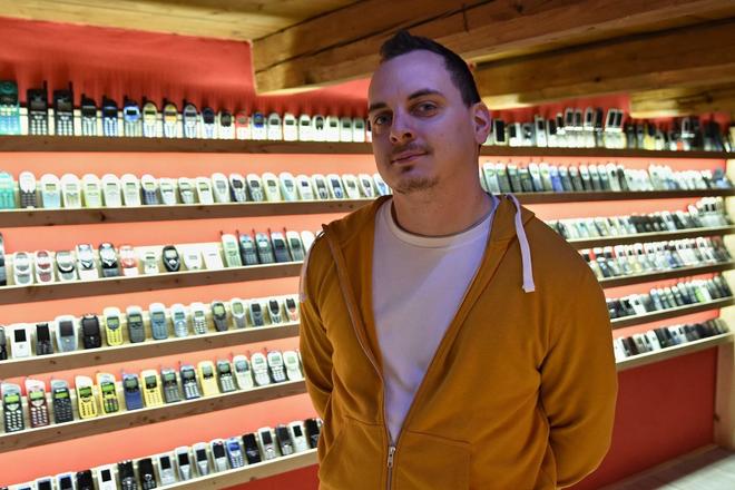 Štefan Polgári in his Museum of Vinatge Mobile Phones, Dobšiná