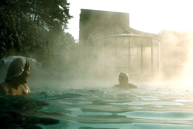 People enjoying hot water in Bojnice spa.
