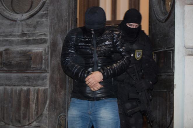 Members of the Takáčovci gang are brought to the Specialised Criminal Court.  