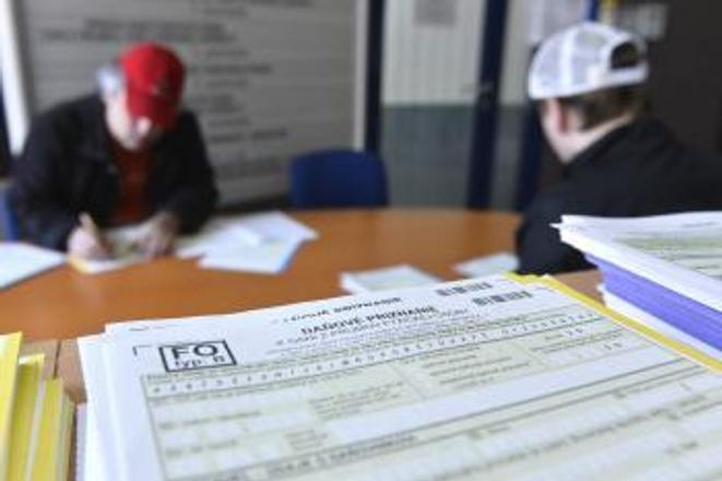 Paying taxes. 