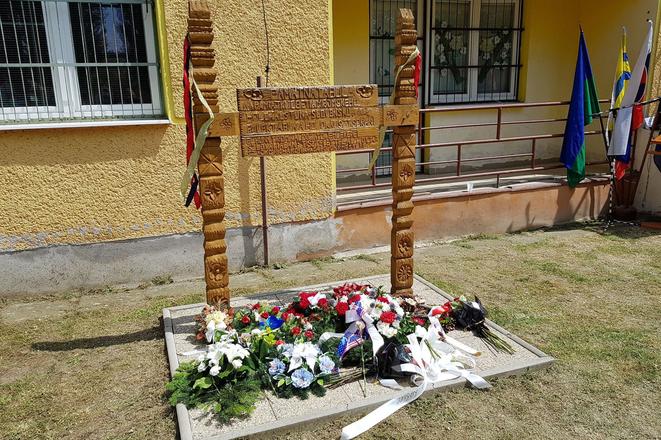 Wooden memorial that was crafted by a Roma woodcarver to mark Roma Holocaust Memorial Day.