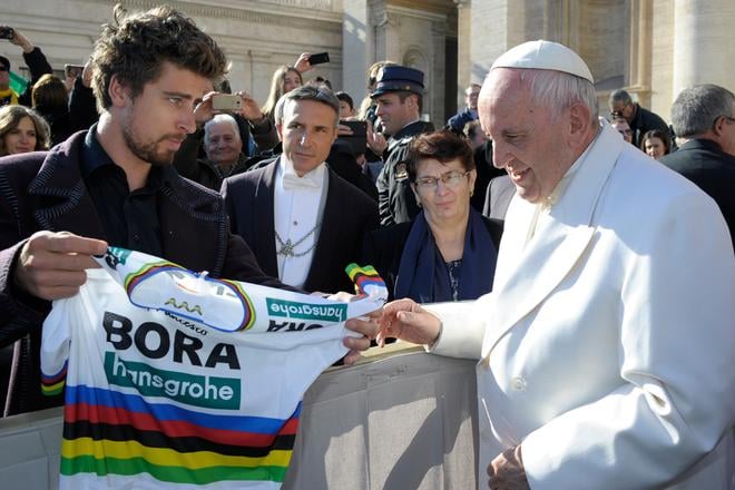 Three-time cycling World champion Peter Sagan presents Pope Francis with a World Champion rainbow jersey, during the pontiff's general audience, in St Peter's Square, at the Vatican.