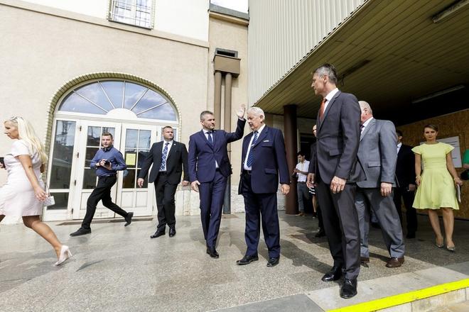 In forefront: 2L Prime Minister Peter Pellegrini, 3L Head of the Main Station Bratislava Pavol Országh and 4L Bratislava Mayor Ivo Nesrovnal visit the station, August 28.