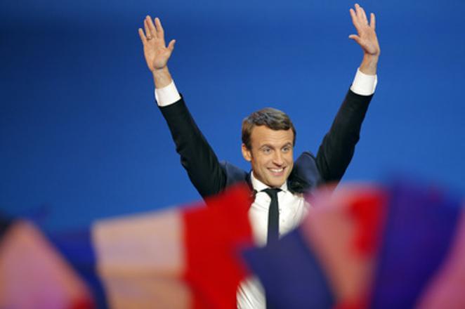 Emmanuel Macron rejoices after the first round of French presidential election