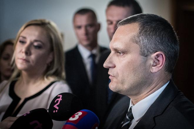 Interior Minister Denisa Saková (left) and Radoslav Štrba, acting Head of the Office for the Protection of Constitutional Officials, speak to journalists. 