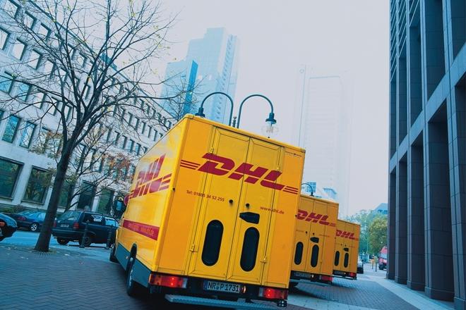 DHL transport vehicles, illustrative stock photo