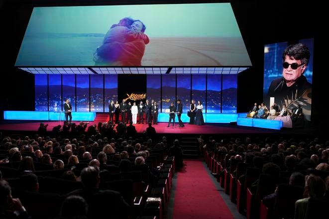 Director Jafar Panahi, accepts of the Palme d'Or for the film 'It Was Just an Accident', during the awards ceremony of the 78th international film festival, Cannes, southern France, Saturday, May 24, 2025.