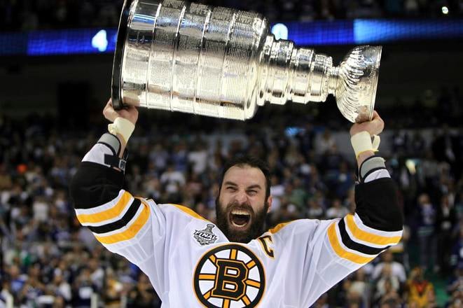 Boston Bruins' Zdeno Chára hoists the Stanley Cup following the Bruins' 4-0 win over the Vancouver Canucks in Game 7 of the NHL Finals on June 15, 2011.