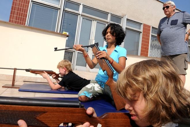 Children in summer camps fire the air rifle occasionally.
