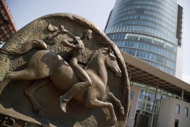 Bronze statue of Biatec in front of the National Bank of Slovakia headquarters.